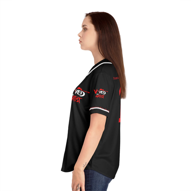 A woman wearing a baseball jersey 