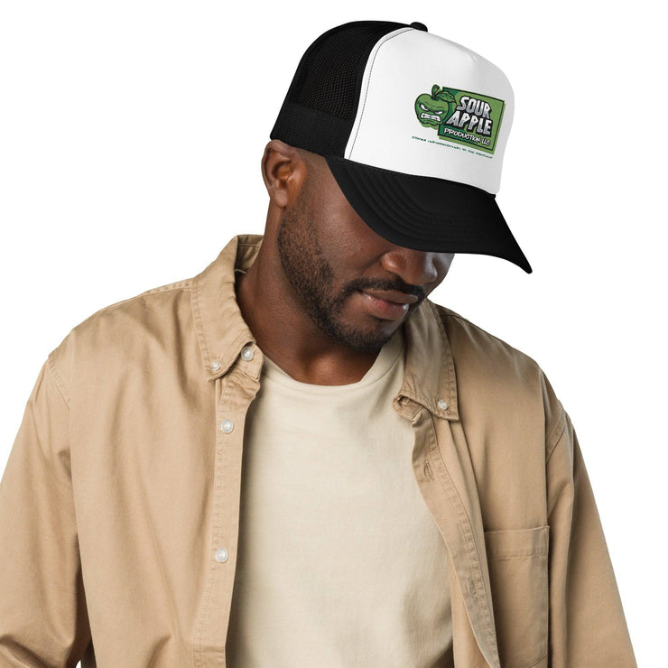 White and black Sour Apple Foam Trucker Hat with green apple logo, offering a classic and versatile design.