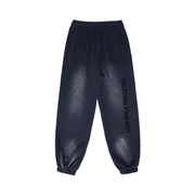 Navy blue Sour Apple men's heavyweight athleisure sweatpants with a sun faded effect and elastic cuffs, featuring a relaxed fit and side branding.