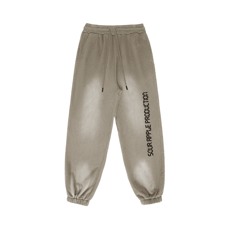 Beige Sour Apple men's heavyweight athleisure sweatpants with a sun faded design, elastic waistband, and oversized fit for casual streetwear style.