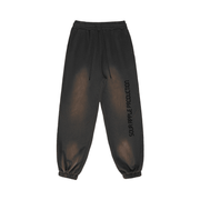 Charcoal Sour Apple men's heavyweight athleisure sweatpants with a sun-faded design, featuring elastic cuffs and a relaxed, baggy fit.