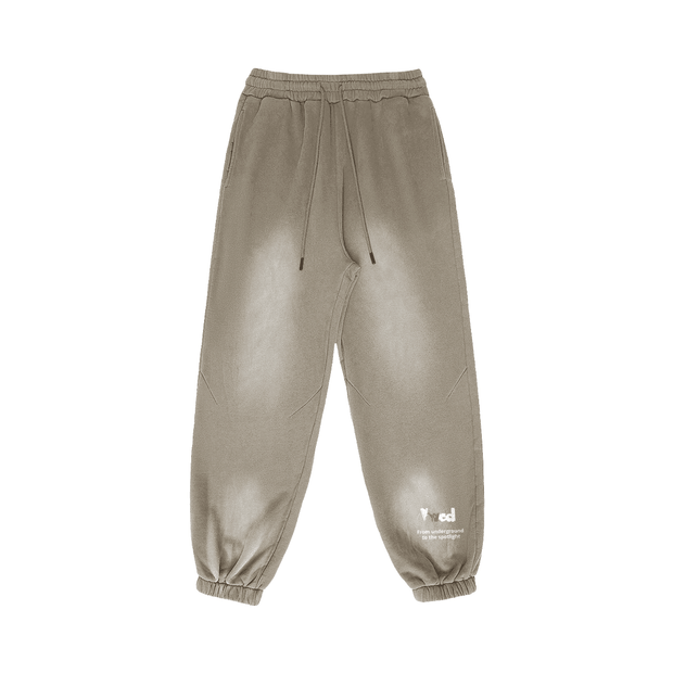 Viv'ed the Artist Men's Athleisure Wear Sun-Faded Heavyweight Sweatpant in beige with a smoky sun faded look, drawstring waist, and relaxed fit.